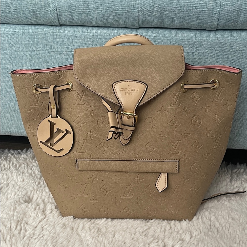 Tan Monogram Backpack with Pink Lining
